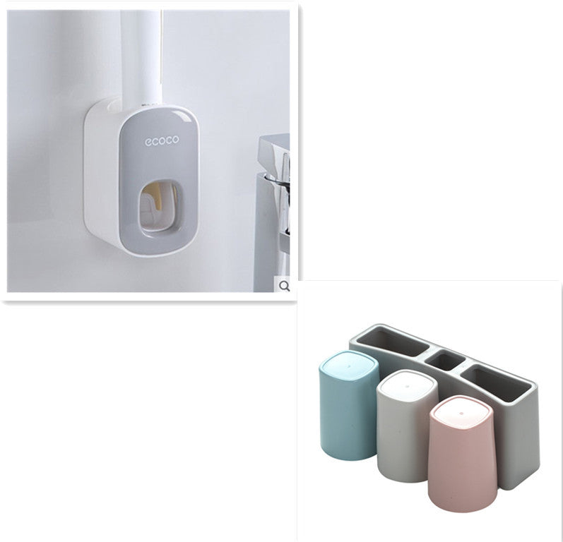 Bathroom organizer with toothbrush holders and a toothpaste dispenser on a white background
