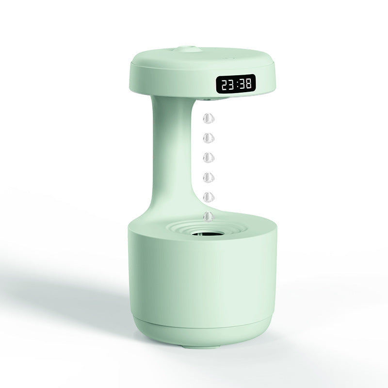 Mint green electronic device with digital display on a white background